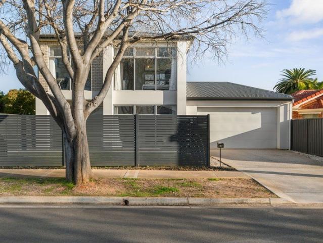 Low maintenance, dual level living that makes you fall in love with lifestyle again