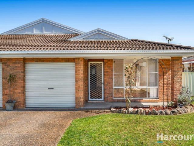 Low maintenance duplex, large backyard