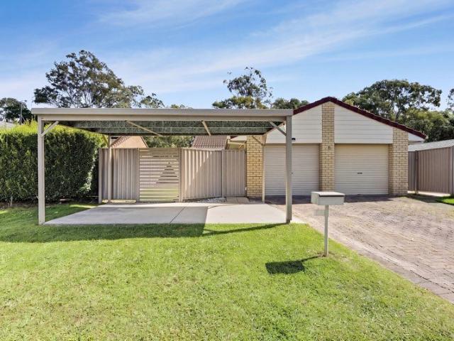 LOW MAINTENANCE DUPLEX WITH GENEROUS OUTDOOR LIVING