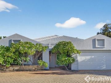Spacious Single Level Family Living Backing Onto Reserve