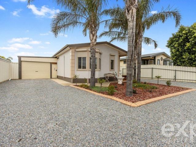 Low Maintenance Home with Solar, Battery & Established Grounds