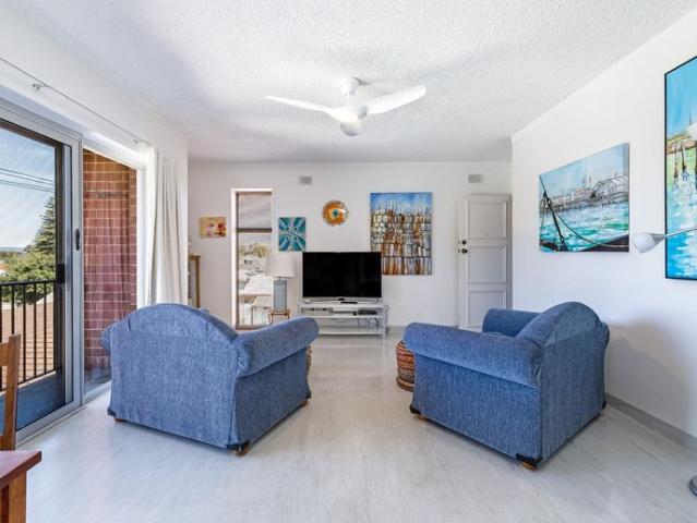 Low maintenance living minutes from the beach