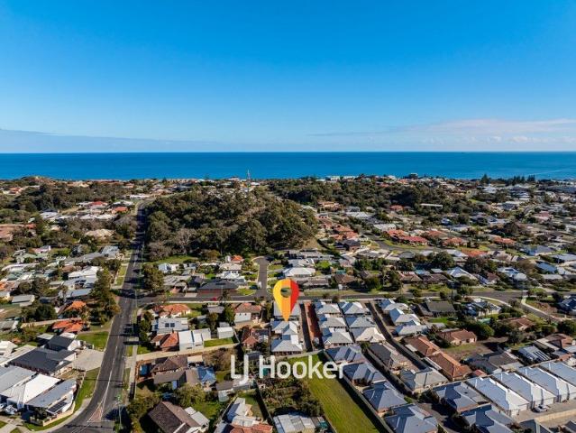 Low Maintenance Living Near the Coast!