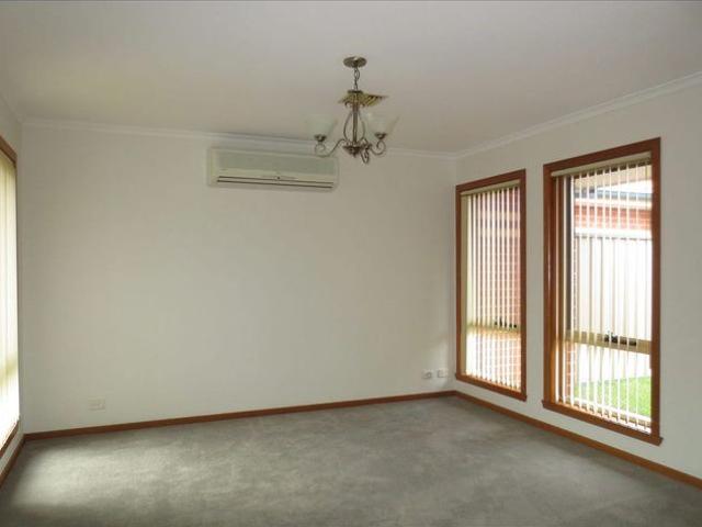 LOW MAINTENANCE LIVING ONLY A SHORT STROLL FROM BEACH