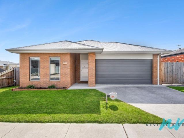 Low Maintenance Living Only Moments to the Town & Beach