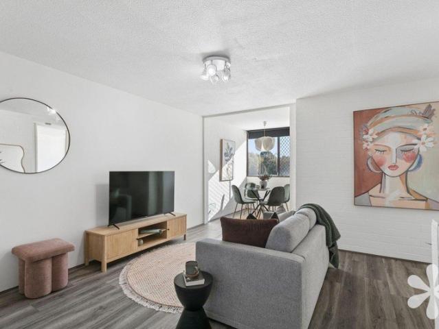 Low Maintenance Living, High Convenience Location