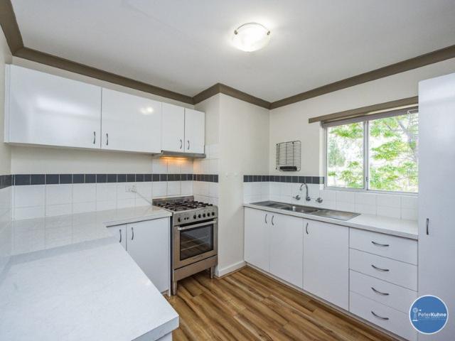 LOW MAINTENANCE LIVING IN A CONVENIENT LOCATION