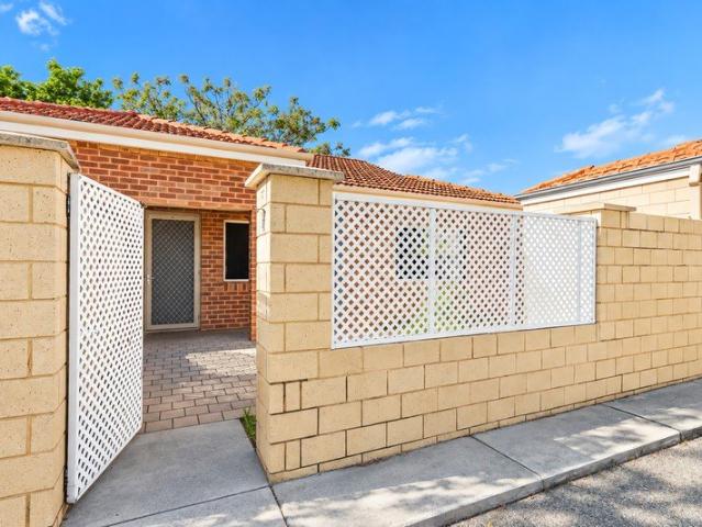 LOW MAINTENANCE LIVING IN A HIGHLY CONVENIENT LOCATION
