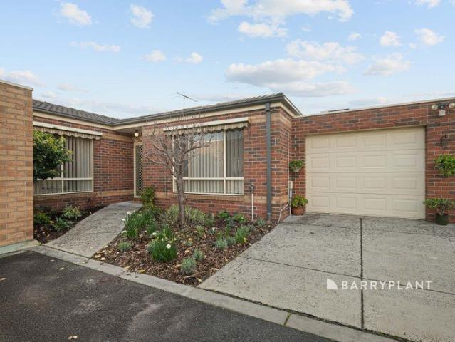 Low Maintenance Living in a Peaceful Parkside Setting