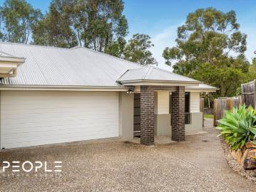 Low Maintenance Living in a Peaceful Parkside Setting Ready To Move In