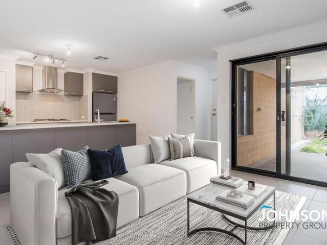 LOW MAINTENANCE LIVING IN A PRIME LOCATION