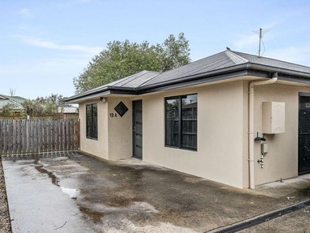 Low Maintenance Living in a Quiet Riverside Location