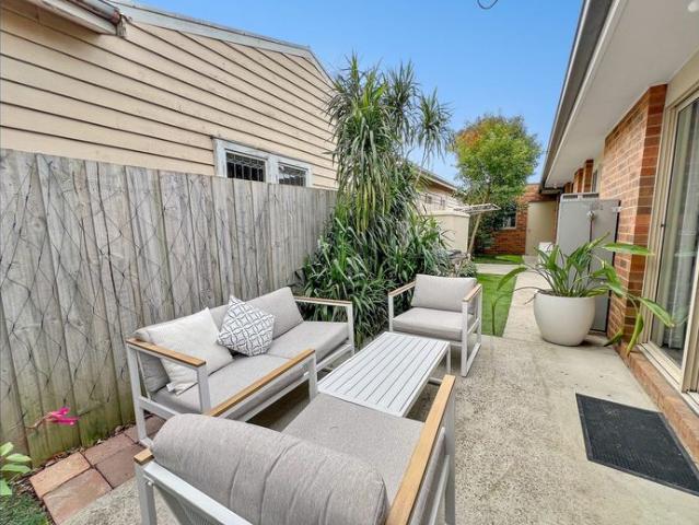 Low maintenance living in prime Belmont location