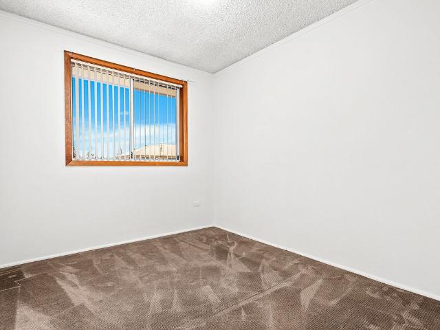 LOW MAINTENANCE LIVING IN PRIME COASTAL LOCATION