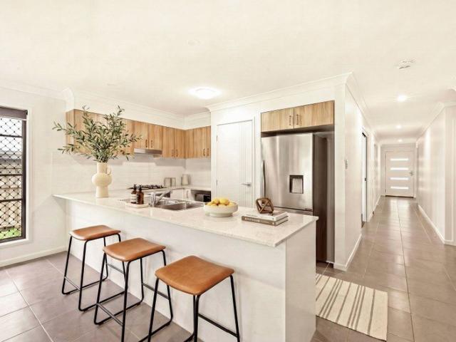 Low Maintenance Living in Sought After Upper Kedron