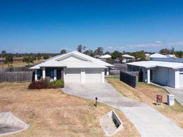 LOW MAINTENANCE LIVING IN THE HEART OF ROSEWOOD