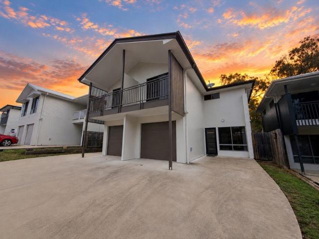 LOW MAINTENANCE LIVING WITH A POOL AT YOUR DOORSTEP!