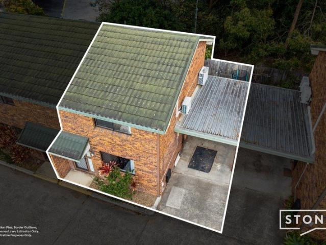 Low Maintenance Living with a Spacious Courtyard
