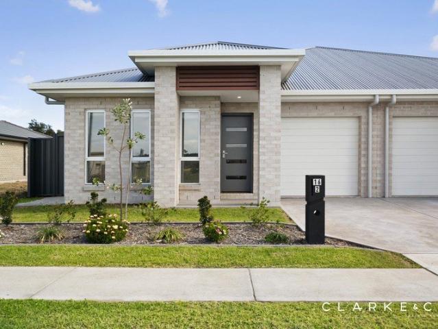LOW MAINTENANCE LIVING WITH A STUNNING OUTLOOK!