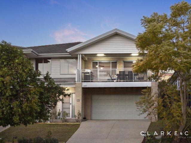 LOW MAINTENANCE LIVING WITH AN IMPRESSIVE OUTLOOK!