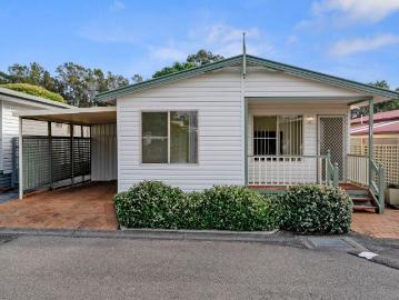 Low Maintenance Living with Extra Space & Sunroom Comfort!