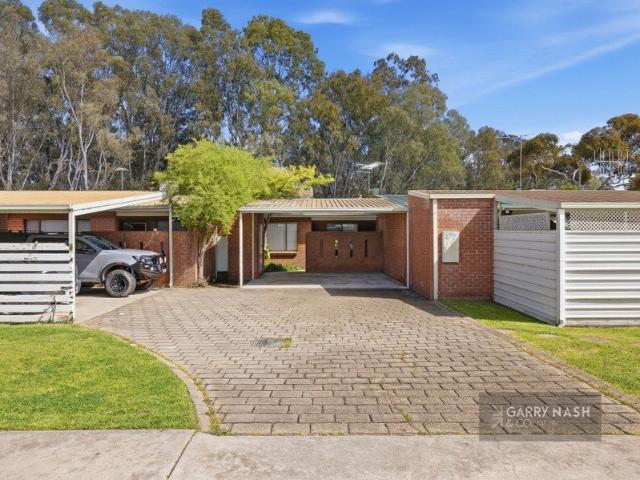 LOW MAINTENANCE LIVING WITH INVESTMENT APPEAL