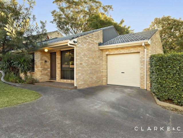 LOW MAINTENANCE LIVING WITH INVESTMENT APPEAL!
