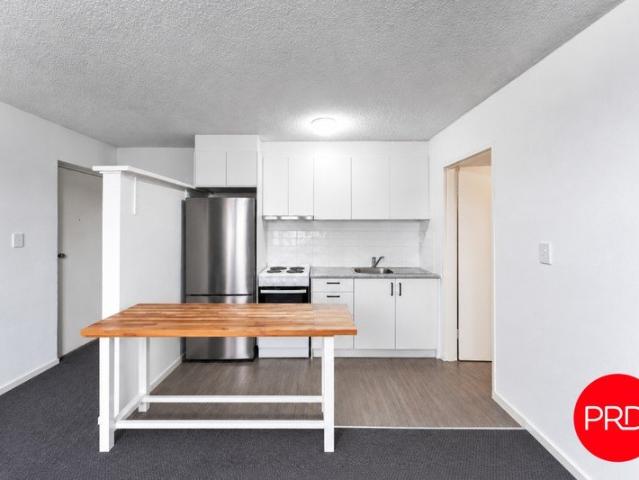 LOW MAINTENANCE LIVING WITH INVESTMENT APPEAL