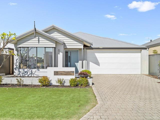 LOW MAINTENANCE LIVING, WITH MORE ROOM WHERE IT COUNTS