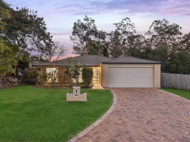 Low Maintenance Living with Multiple Living Areas & Expansive Backyard