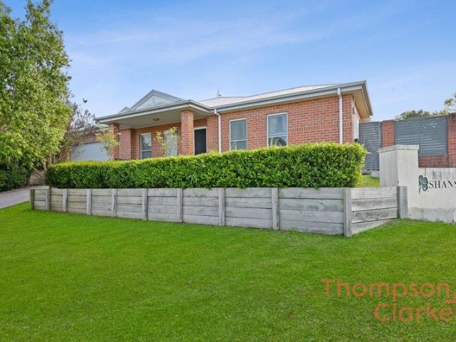 Low Maintenance Living with Side Access Appeal