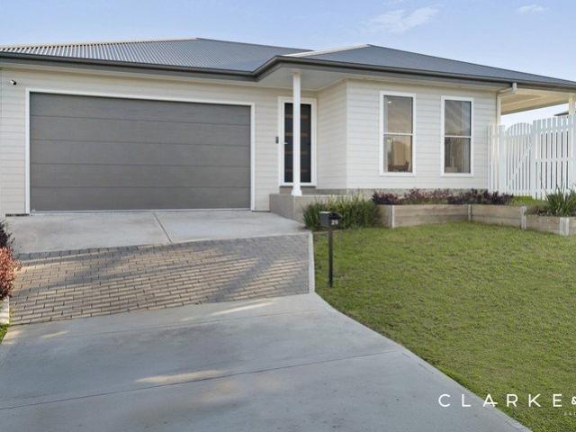 LOW MAINTENANCE LIVING WITH SPACIOUS INDOOR OUTDOOR APPEAL!