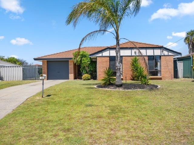LOW MAINTENANCE LIVING, WITH SWEEPING GARDEN SURROUNDS AND CONVENIENCE THROUGHOUT
