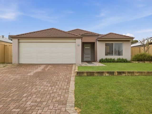LOW MAINTENANCE LIVING WITHIN A CENTRAL AND POPULAR SETTING