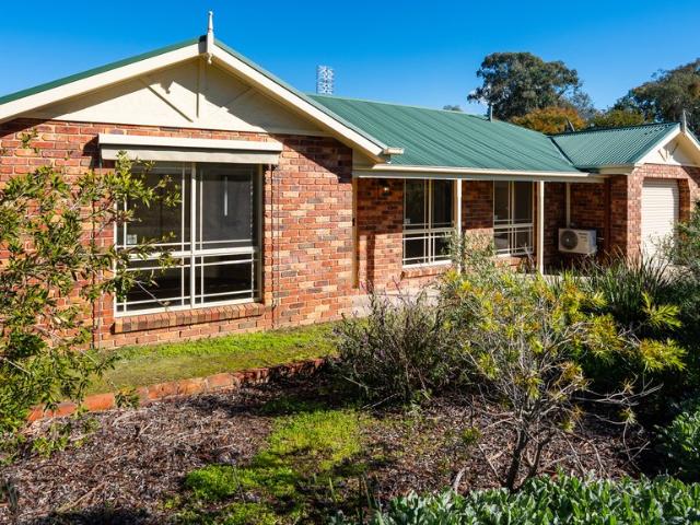 Low Maintenance Lifestyle townhouse with Proven Investment Appeal