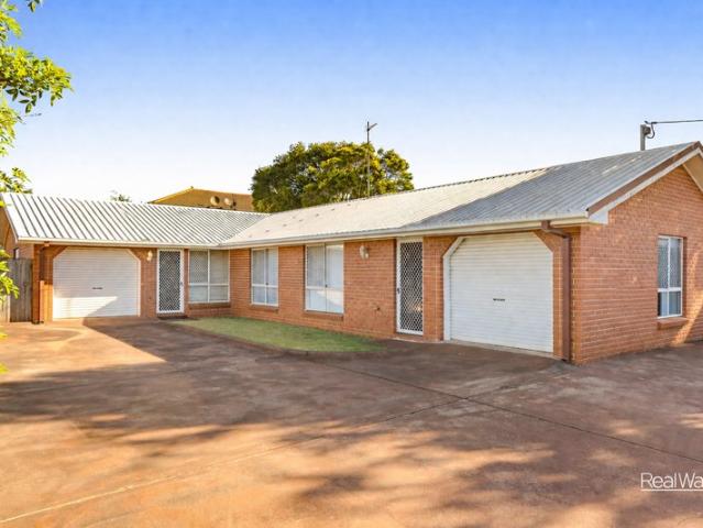 Low Maintenance, Modern Comfort in a Peaceful Single Level Duplex Setting