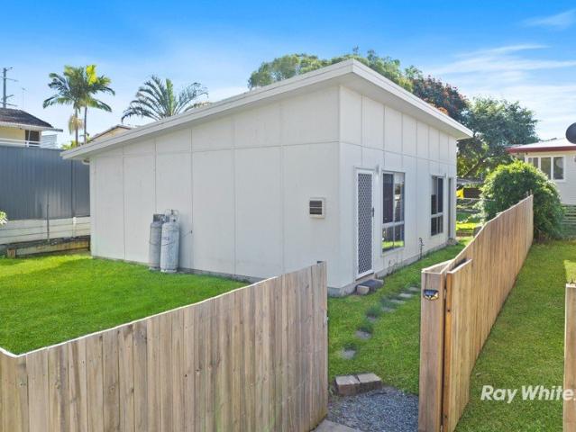 Low Maintenance, Modern & Convenient Unit Rent Includes the Water Bill!