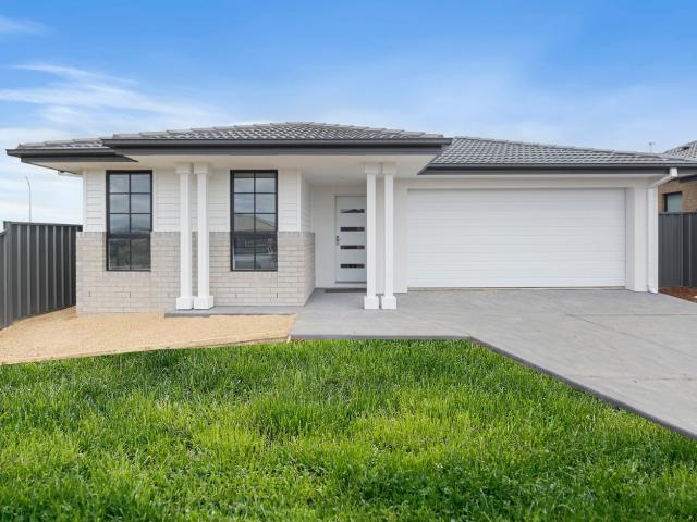 Low maintenance near new home in popular Lucas