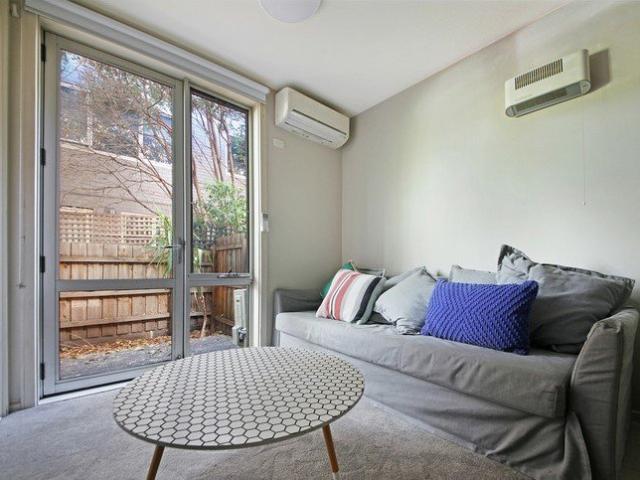 Low Maintenance Studio Living with Large Courtyard! Furnished!