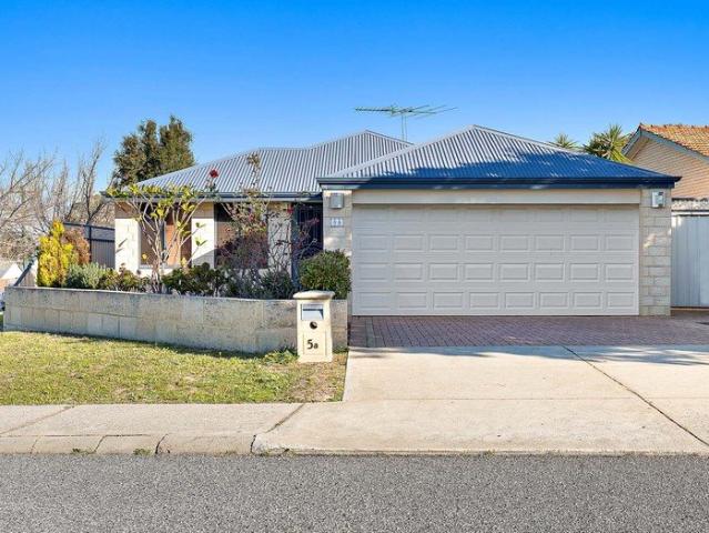 Low Maintenance Street Front Home!