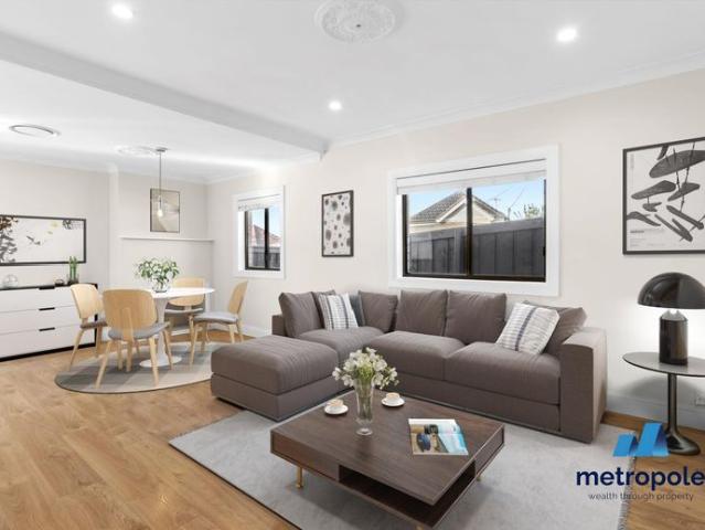 LOW MAINTENANCE, PRIVATE AND A WALK TO EVERYTHING!