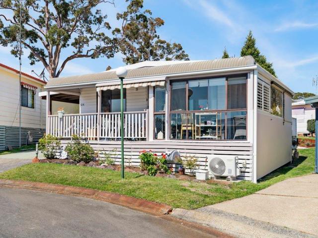 Low Maintenance Retirement Living with Lake Glimpses