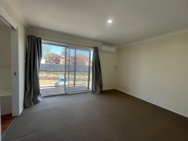 Low maintenance townhouse meters from the beach!