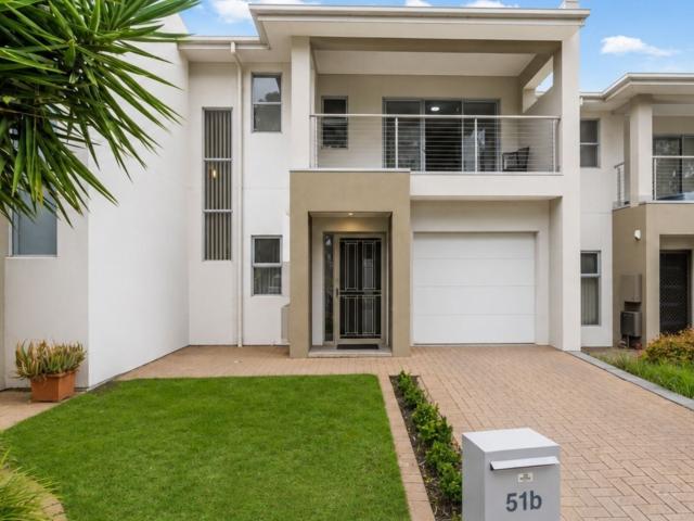Low maintenance townhouse of generous proportions in great location