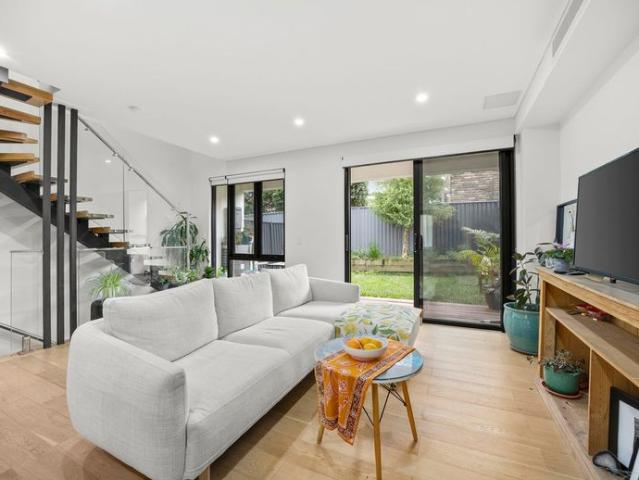 Low Maintenance Townhouse in a Private Rear Position