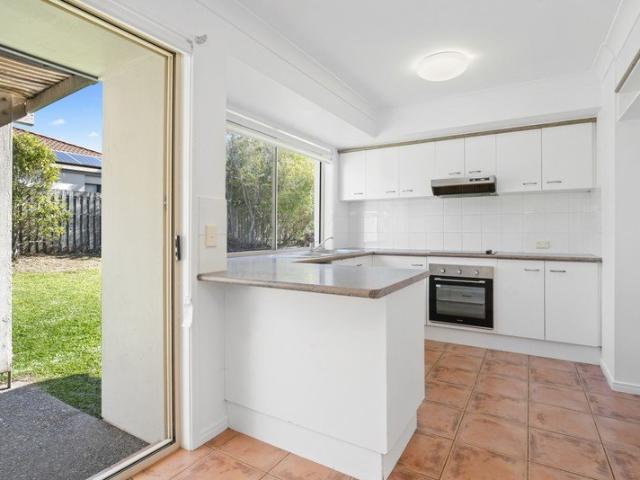 LOW MAINTENANCE TOWNHOUSE IN GATED COMPLEX