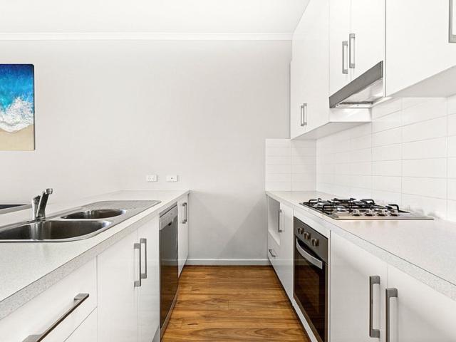 Low maintenance townhouse living in a location that has it all
