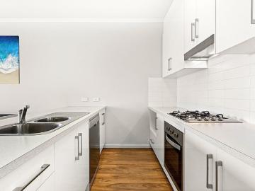 Low maintenance townhouse living in a location that has it all