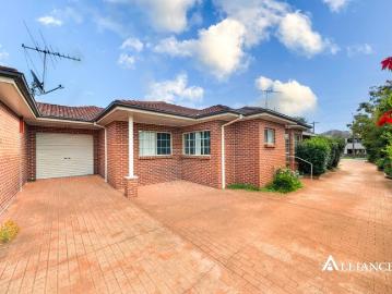 Low Maintenance Villa Living in a Small Complex of Three