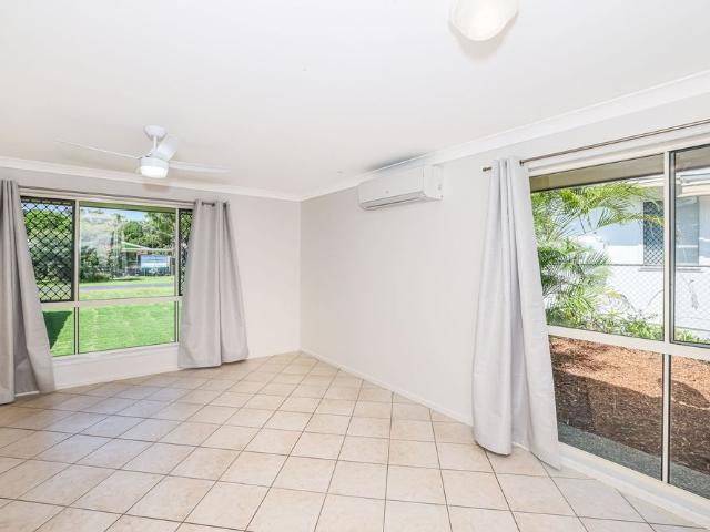 LOW SET BRICK AND TILE HOME IN SOUGHT AFTER RED BEACH